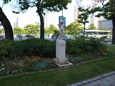 Flowers and Statue in a Small Park.JPG